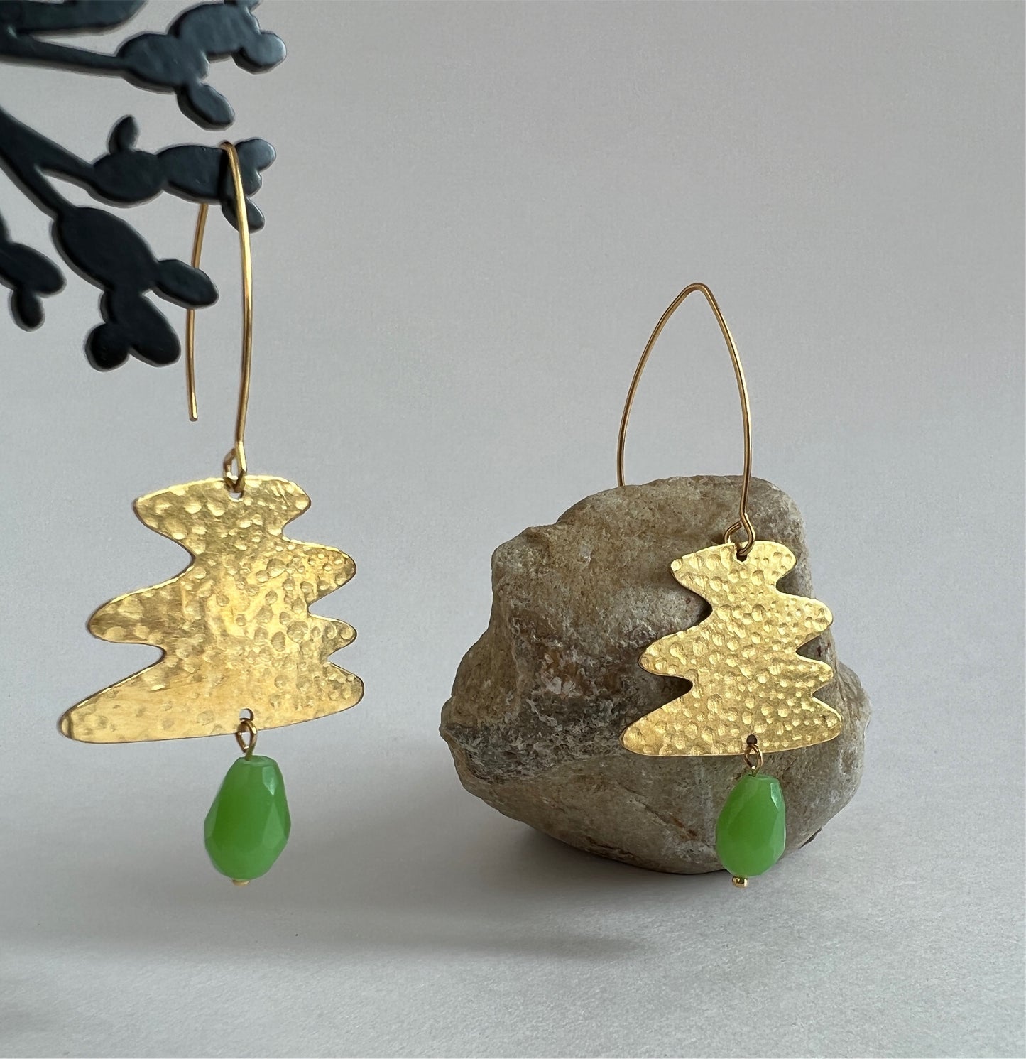 Wavy Earrings with a Green Bead