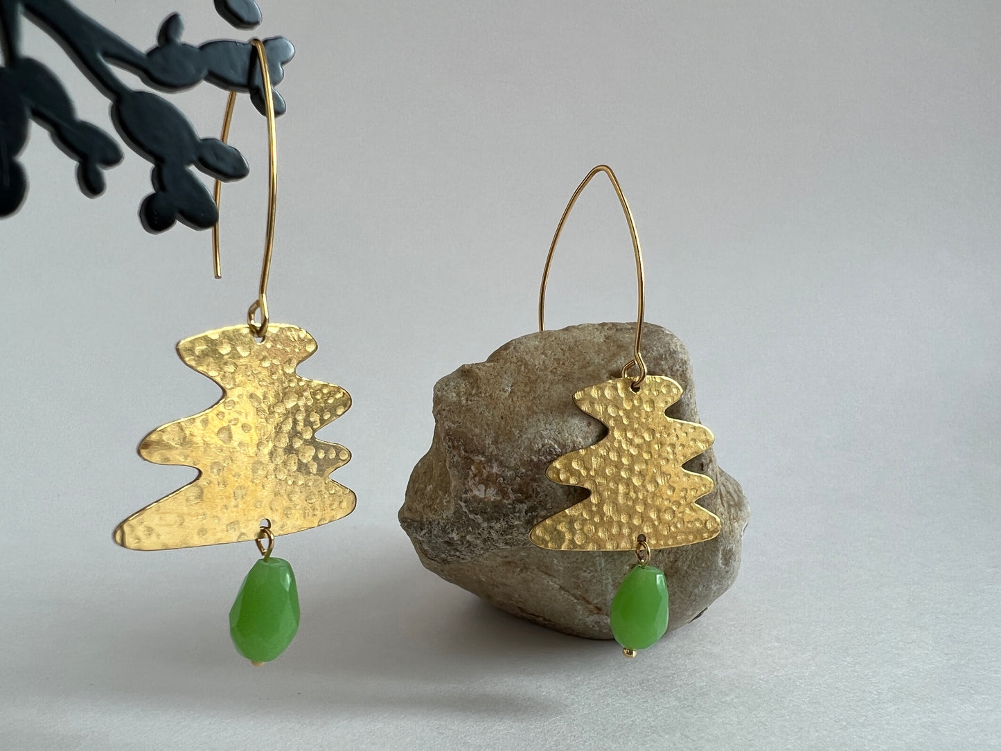 Wavy Earrings with a Green Bead