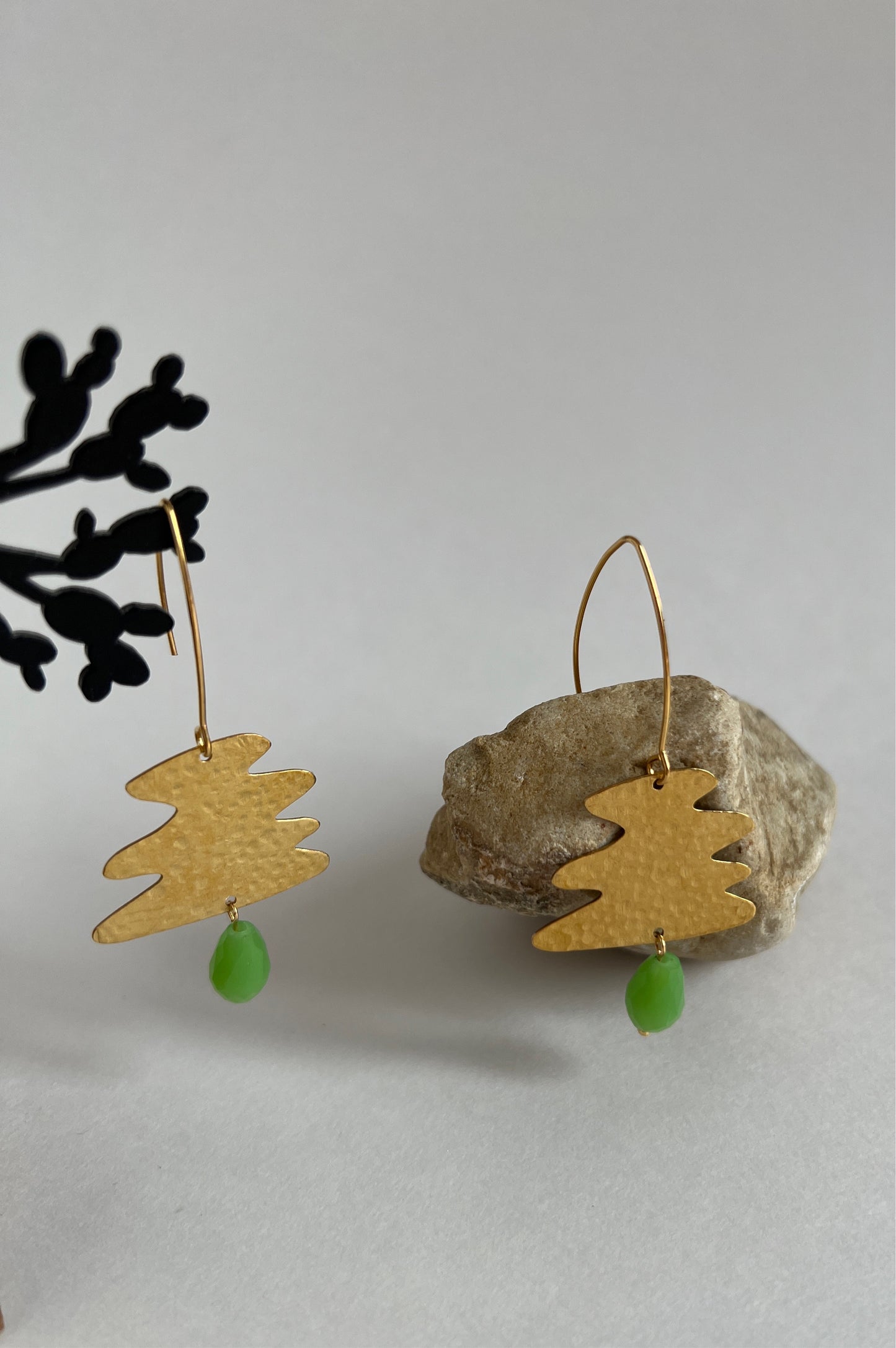 Wavy Earrings with a Green Bead